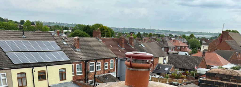 This is a photo taken from a roof which is being repaired by LS Roofing Henley-on-Thames, it shows a street of houses, and their roofs