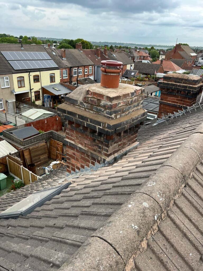 This is a photo taken from a roof which is being repaired by LS Roofing Henley-on-Thames, it shows a street of houses, and their roofs